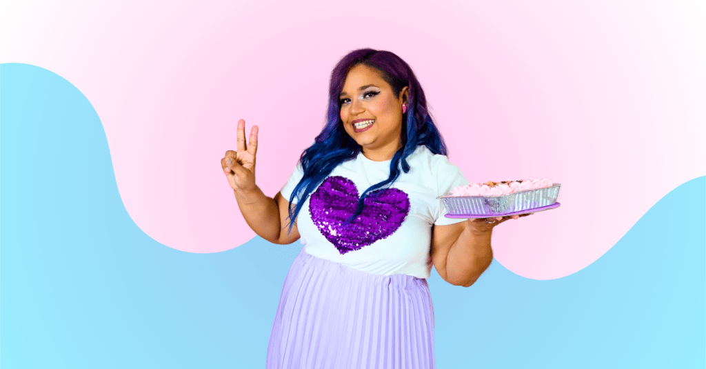 The company ownder, young female, holding a tres leches cake